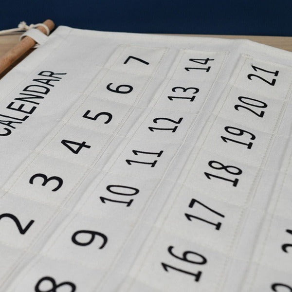 Wall Pocket Calendar Hanging Organizer – Monthly Day-Wise Planner with Clear Pockets for Saving Important Dates & Special Reminders